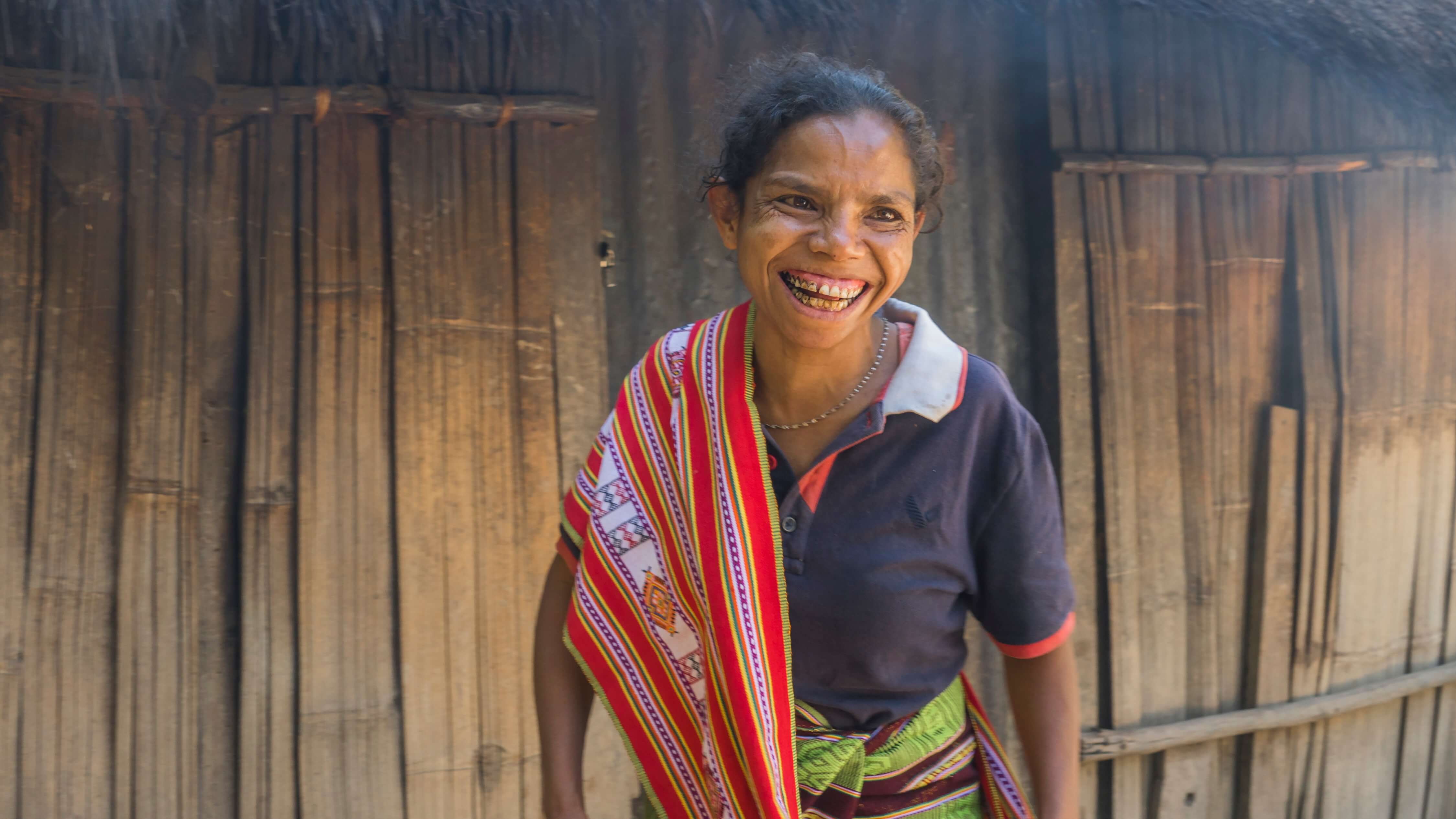 Weaver Amelia “Meri” Koi, wearing her rendition of North Mollo’s traditional pau kolo motif—produced by combining the tenun lotis technique with embroidery. Amelia is among the weavers working with Lakoat Kujawas, and her six daughters have all been taught the art. Photo by Andra Fembriarto